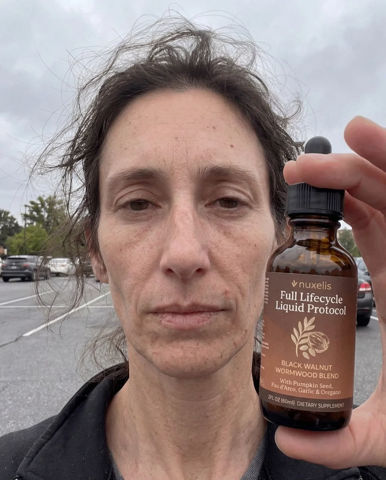 Jennifer R. holding ParaCycle bottle outdoors