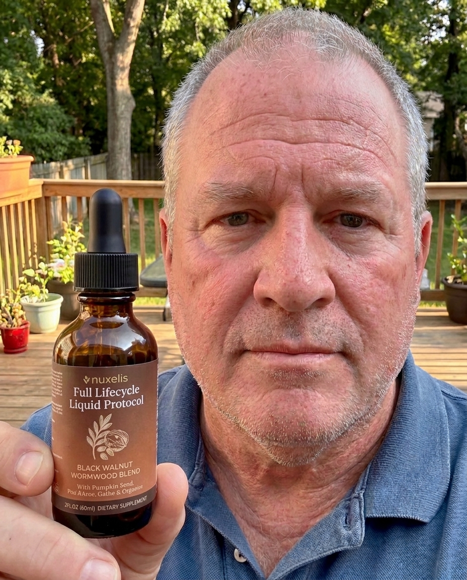 James C. holding a bottle of Nuxelis ParaCycle